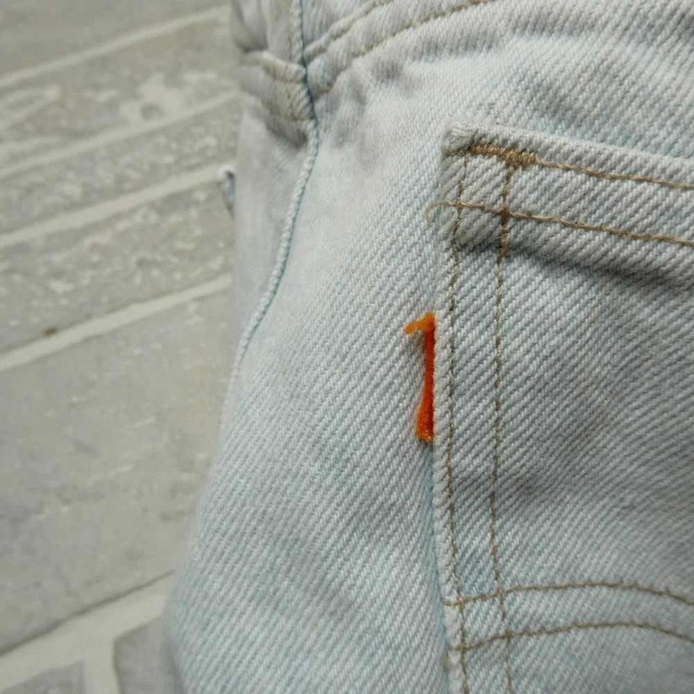 VINTAGE Levis Jeans Size 37x33 Light Wash Slight Taper USA Made Orange Tab